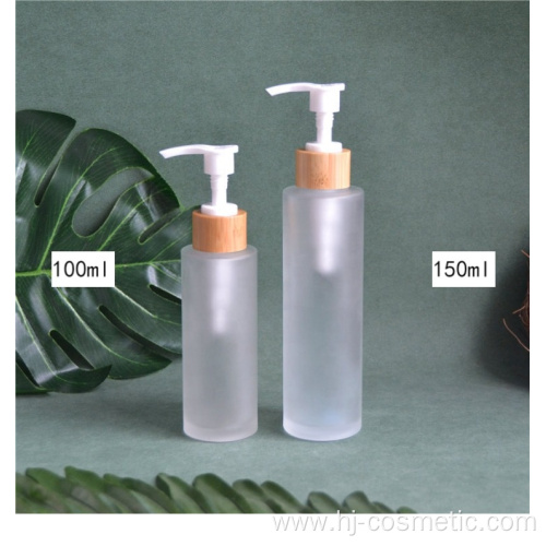 wholesale Frost 150ml 100ml glass bottle with bamboo wooden lotion sprayer pump Customized Made Cosmetic packaging